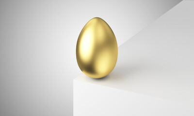 Gold Easter Egg standing on a corner of white box on studio background - 577140617