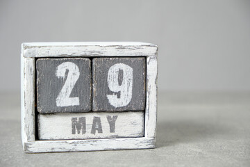 May 29 calendar made wooden cubes gray background.With an empty space for your text.