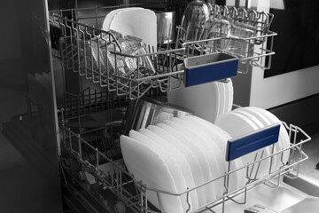 Open dishwasher in the kitchen.