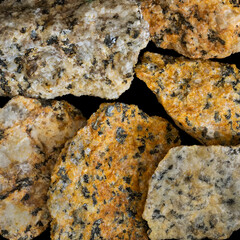 Raw granite stones, igneous rock, macro shot
