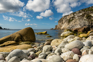 Fototapeta na wymiar Beautiful white stones washed round by the sea on the beach of Ashleam Bay on Achill Island