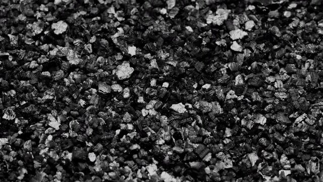Abstract background. Black sand grunge background. Сlose-up.