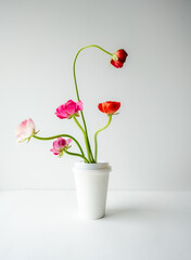 Flowers in coffee cup background