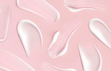 pattern cosmetic smears cream texture on pink background