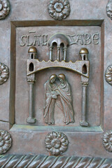 A fragment of the entrance bronze door of the world's largest Ba