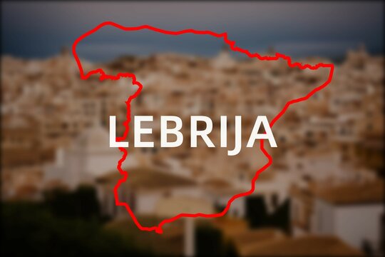 Lebrija: Der Name der spanischen Stadt Lebrija in der Region Andalusia vor einem Hintergrundbild