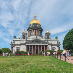 St. Petersburg, Russia - July 15, 2022 - Magnificent St. Isaac's Cathedral with numerous resting...