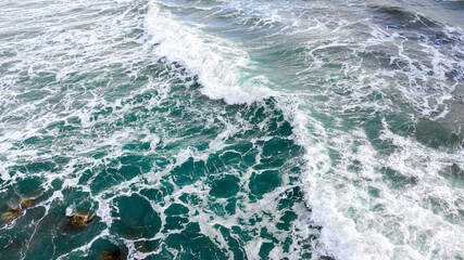 Closeup of rough seas. Shades of blue color the water.