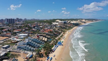Fototapeta na wymiar Wonderful aerial view of Ponta Negra beach in the heart of Natal city, Rio Grande do Norte, Brazil 