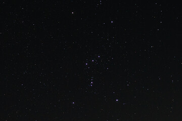 Orion constellation in the wintery night sky with positive lighting 