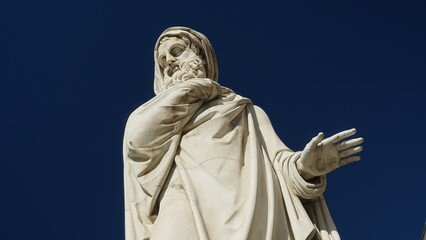 Marble statue of the bearded philosopher man, seen from below