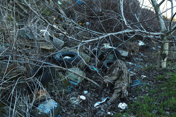 Waste and mess in the nature, recycling, earth day, hill full of waste