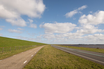 lauwersmeerdijk dike sea wall in Groningen Netherlands needs reinforcements as not currently safe. This ocean barrier is an important part of Dutch flood protection in Holland. Water Project Plan