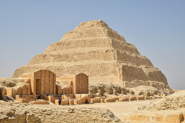 the pyramid view of djoser on saqqara egypt at sunny day - obrazy, fototapety, plakaty