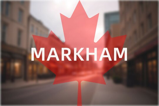 Markham: Der Name der kanadischen Stadt Markham in der Provinz Ontario vor einem Foto mit dem kanadischen Ahornblatt