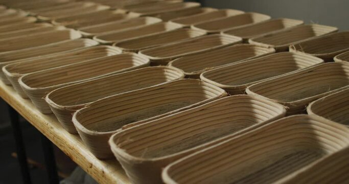 Animation of rows with bred molds preparing for use in bakery