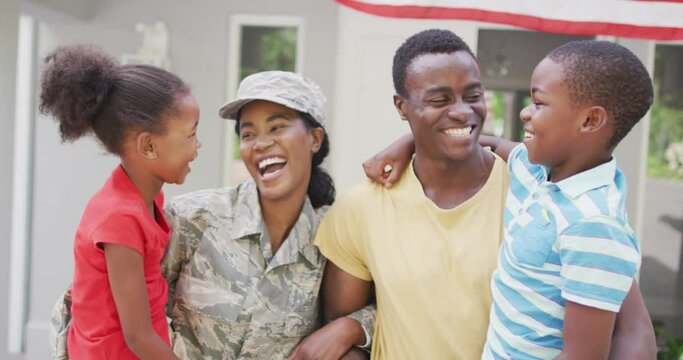 Animation of happy african american family welcoming soldier mother returning home
