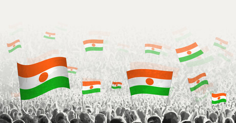 Abstract crowd with flag of Niger. Peoples protest, revolution, strike and demonstration with flag of Niger.