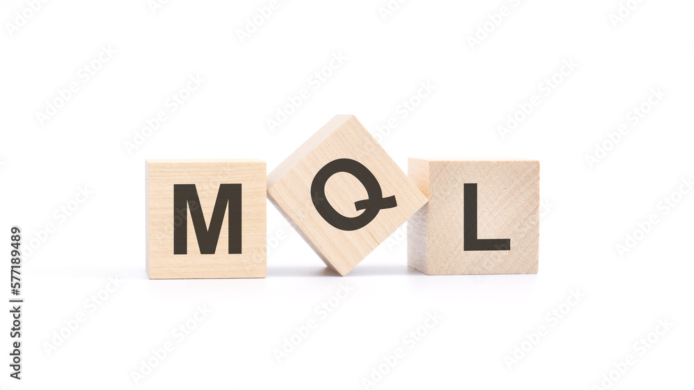 Poster mql - wooden blocks with letters, top view on white background