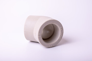 ight PVC pipe tee, adapter connection for water isolated on light background, close-up