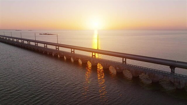 Aerial shot of the Seven Mile Bridge in Florida at sunrise. The bridge connects the Florida Keys on the way to Key West.