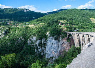 Fototapeta na wymiar Once the biggest vehicular concrete arch bridge in Europe (Djurdjevica Tara).