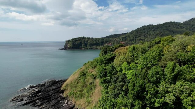 Tilt down drone footage of Khlong Chak beach on sunny day. Ko Lanta island, Krabi Province, Thailand.