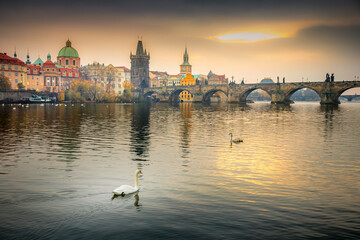 Fototapeta premium Panoramic view over the cityscape of Prague at dramatic dusk, Czech Republic