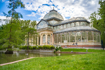 Fototapeta na wymiar Cristal Palace of the Retiro Park in the city of Madrid, during a sunny spring day with blue sky