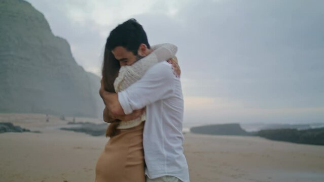 Happy Couple Hugging At Sunset Closeup. Emotional Lovers Celebrating Engagement