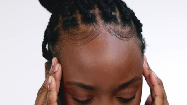 Closeup, headache and black woman with stress, burnout and health against a grey studio background. Zoom, African American female and girl with migraine, fatigue and frustrated with tension or strain