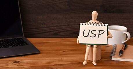There is sketchbook with the word USP. It is an abbreviation for Unique Selling Proposition as...