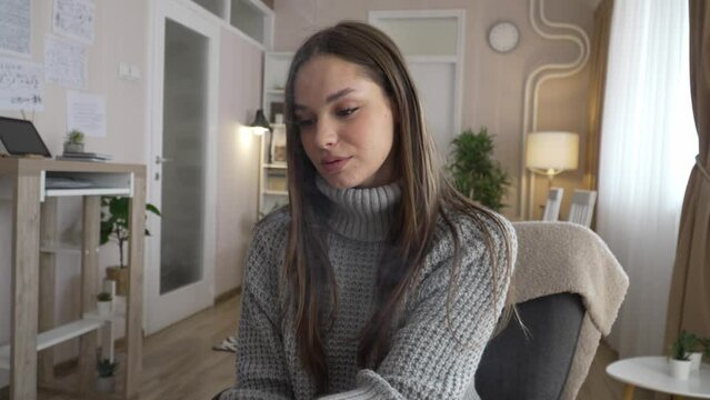 one woman caucasian young smoke cigarette at home addiction concept