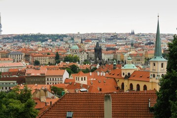 Fototapeta na wymiar Old Town of Prague. Czech republic. Panoramic view of Prague landscape with red roofs.