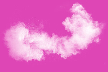 White powder explosion on pink background.White dust particle splashing.