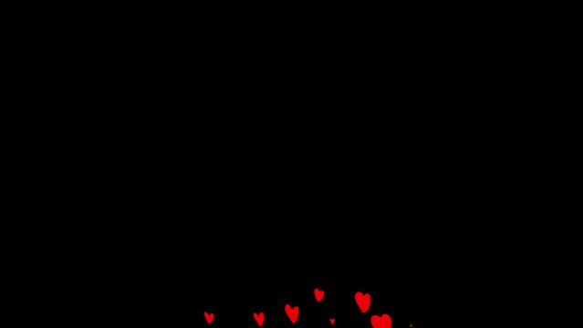 Filling with red hearts on a black screen. Love video transition for a romantic clip. Stock clip in 4k with alpha channel.