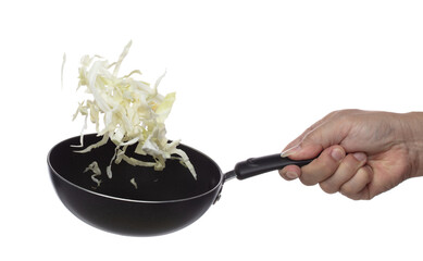 Cabbage fly in pan, green fresh vegetable cabbage cut chop slice food. Organic fresh vegetable with eaten leaf of cabbage falling, close up texture. White background isolated freeze motion high speed