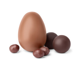Tasty chocolate egg and candies isolated on white