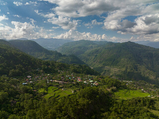 Agricultural plantations and rice terraces on hillsides in a mountainous area. Philippines, Luzon.