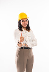 a female architect with hardhat standing with thumb up on isolated background