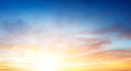 Naklejka na ściany i meble Sunset sky in the Morning with colorful orange sunrise on blue white clouds sky Background