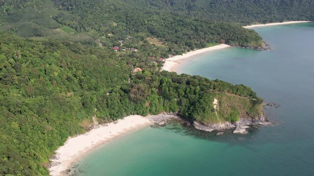 Backward reveal aerial footage of Nui Bay, Khlong Chak and Bamboo beaches on sunny day. Ko Lanta, Krabi Province, Thailand.