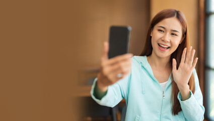 Banner with blank copyspace, Education concept, Teenage girl using smartphone to video call with...