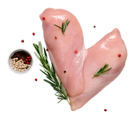 Fresh chicken fillet with spices cut out on transparent background. Heart shaped chicken fillet. Preparation for cooking