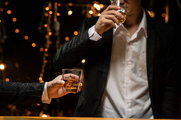 Barman pouring whiskey whiskey glass beautiful night