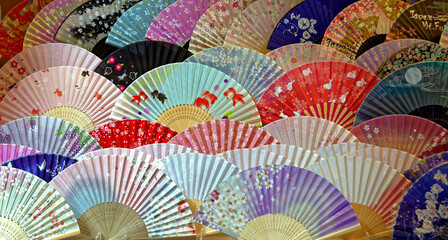 Traditional Japanese paper fans on display at market in Kyoto, Japan.