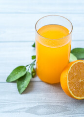Orange juice on wooden table