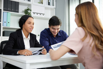 Obraz premium hr managers talking and interviewing female candidate applicant for a new job in the office