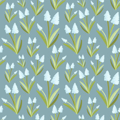 Vector seamless pattern with primroses and spring flowers muscari. The work is done in delicate pastel colors, suitable for any of your designs and decorations. For textile, fabric, wallpaper, cards