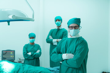 Fototapeta na wymiar Portrait of professor of medicine in cardiology and a team of doctors in the operating room undergoing heart transplant surgery